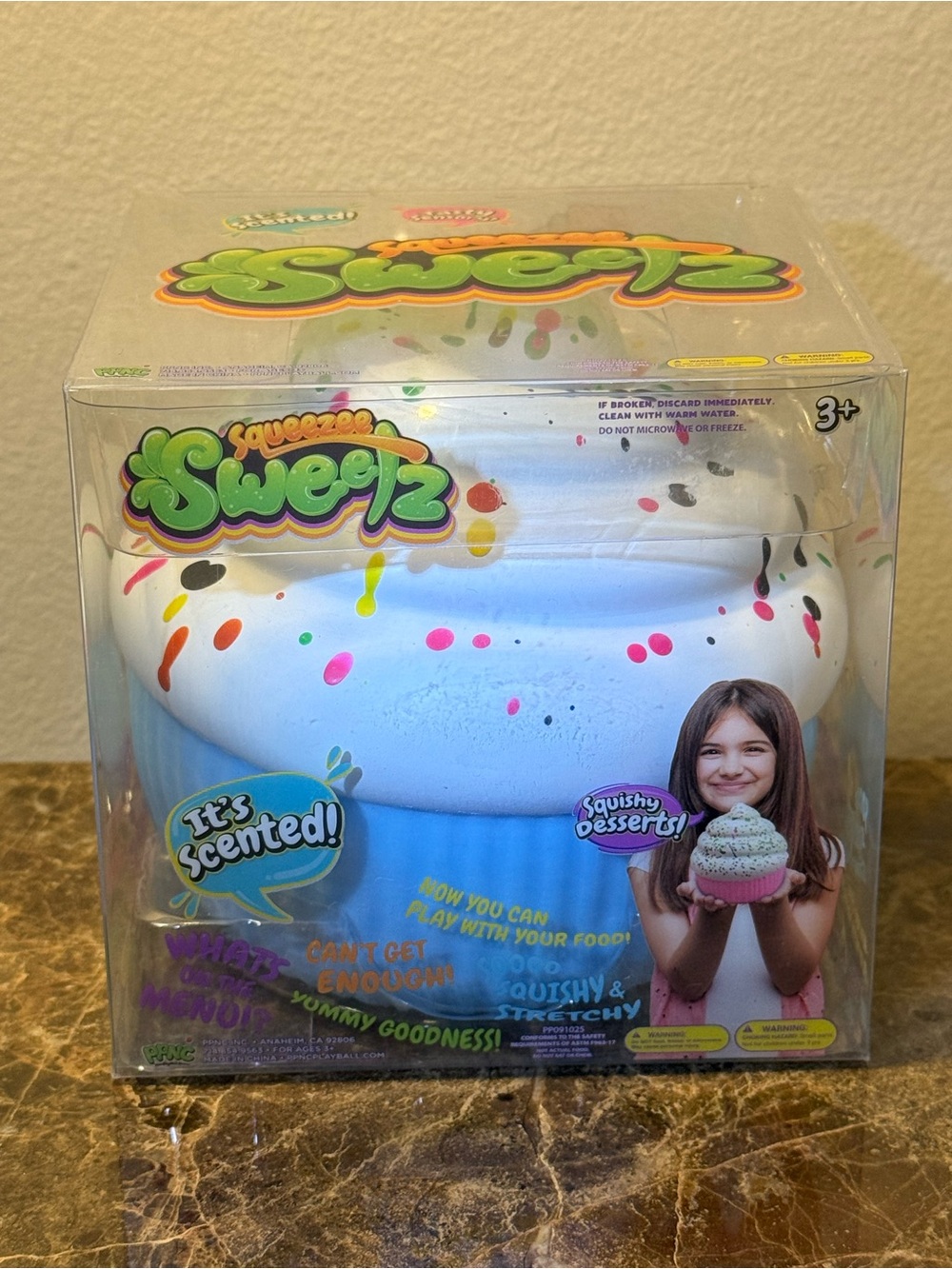 Squeezee Sweetz Scented Cupcake Squishy Toy - White & Blue with sprinkles